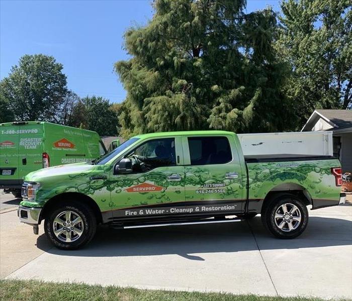 a green SERVPRO truck